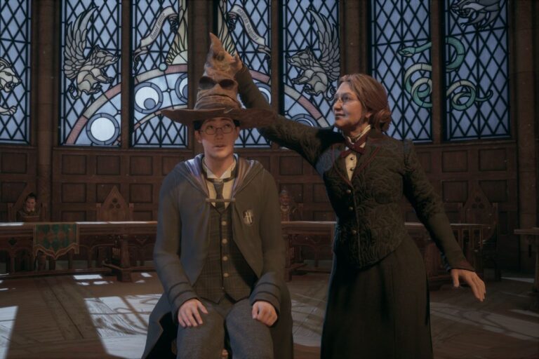 The sorting hat is placed upon a young wizards head in Hogwarts Legacy